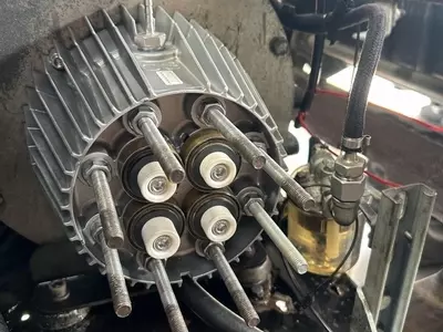 Nilfisk C3 pressure washer pump pistons exposed during industrial diesel hot pressure washer repair in Dover.